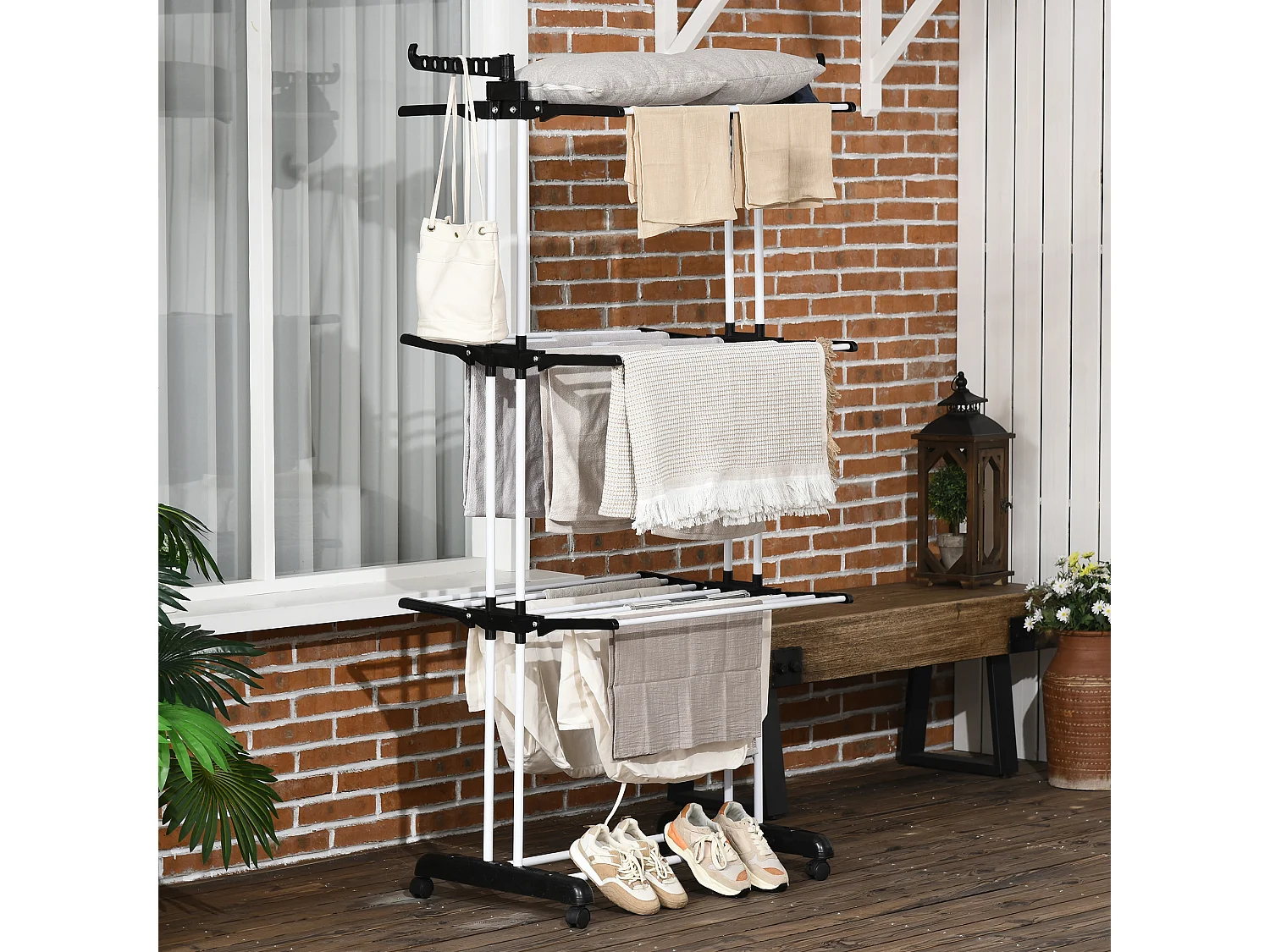 Stendibiancheria a 4 livelli con 4 ruote girevoli in acciaio e pp nero