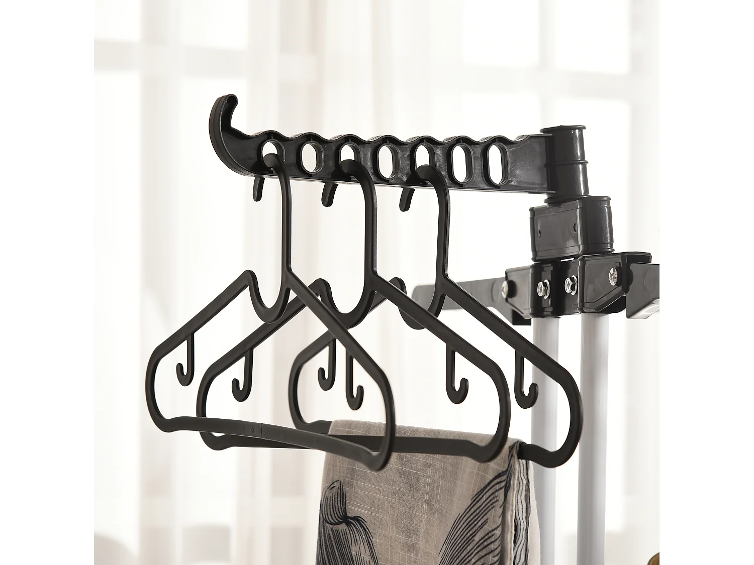 Stendibiancheria a 4 livelli con 4 ruote girevoli in acciaio e pp nero