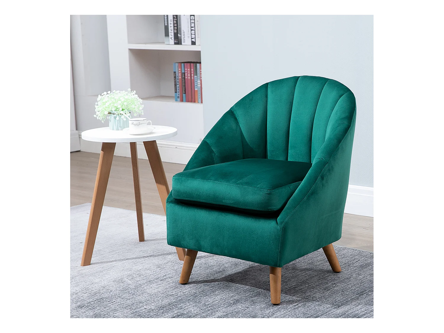 Poltrona da salotto in velluto verde con solida struttura in legno