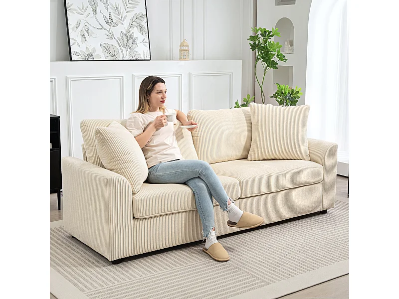 Divano 3 posti con 2 cuscini decorativi in velluto a coste crema