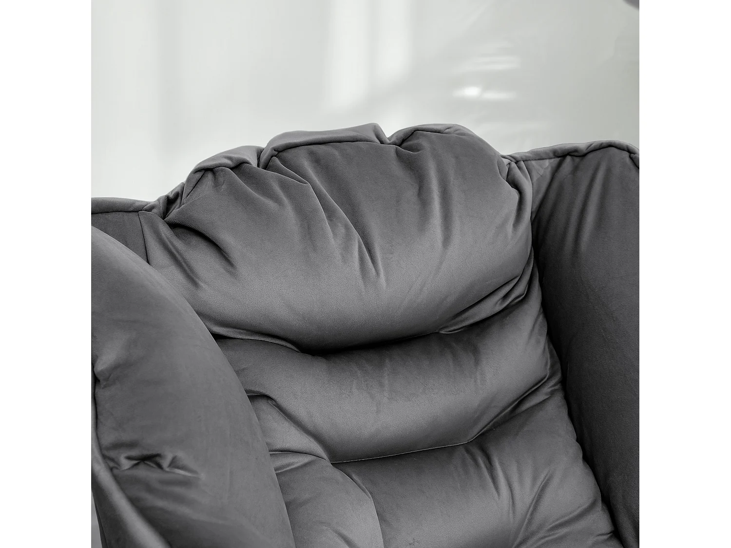 Poltrona moderna con poggiapiedi e tasche Laterali vellutata grigio