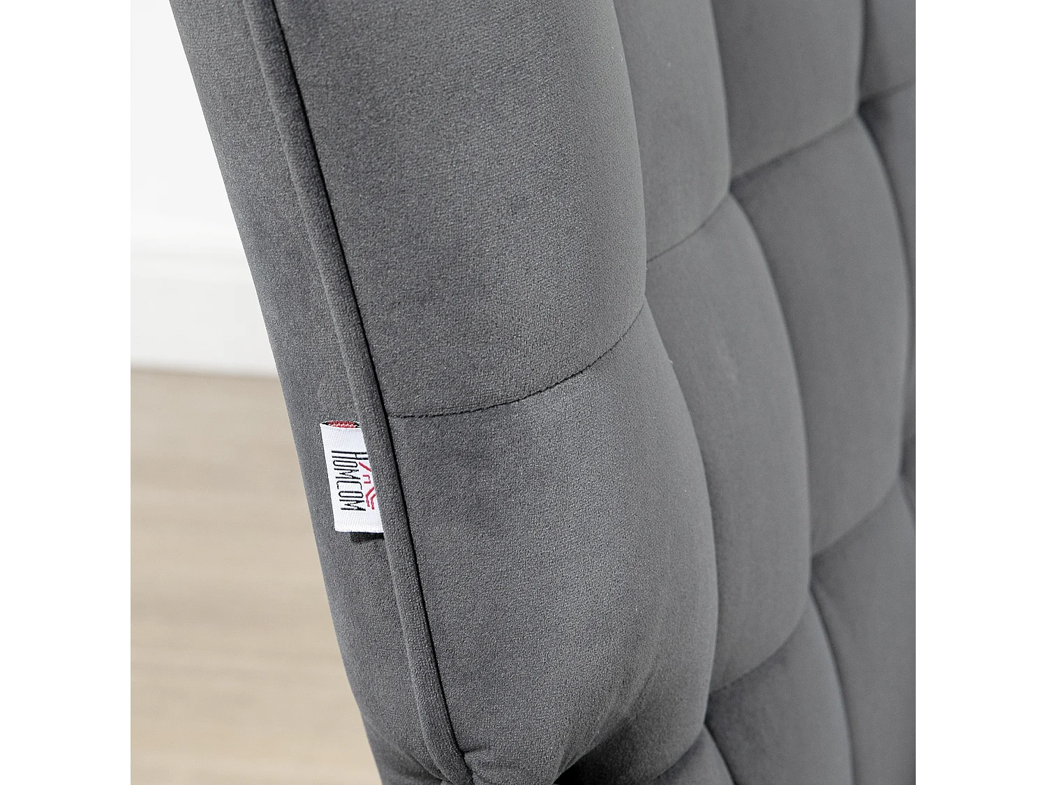 Poltrona d'arredo imbottita con braccioli e poggiapiedi grigio scuro