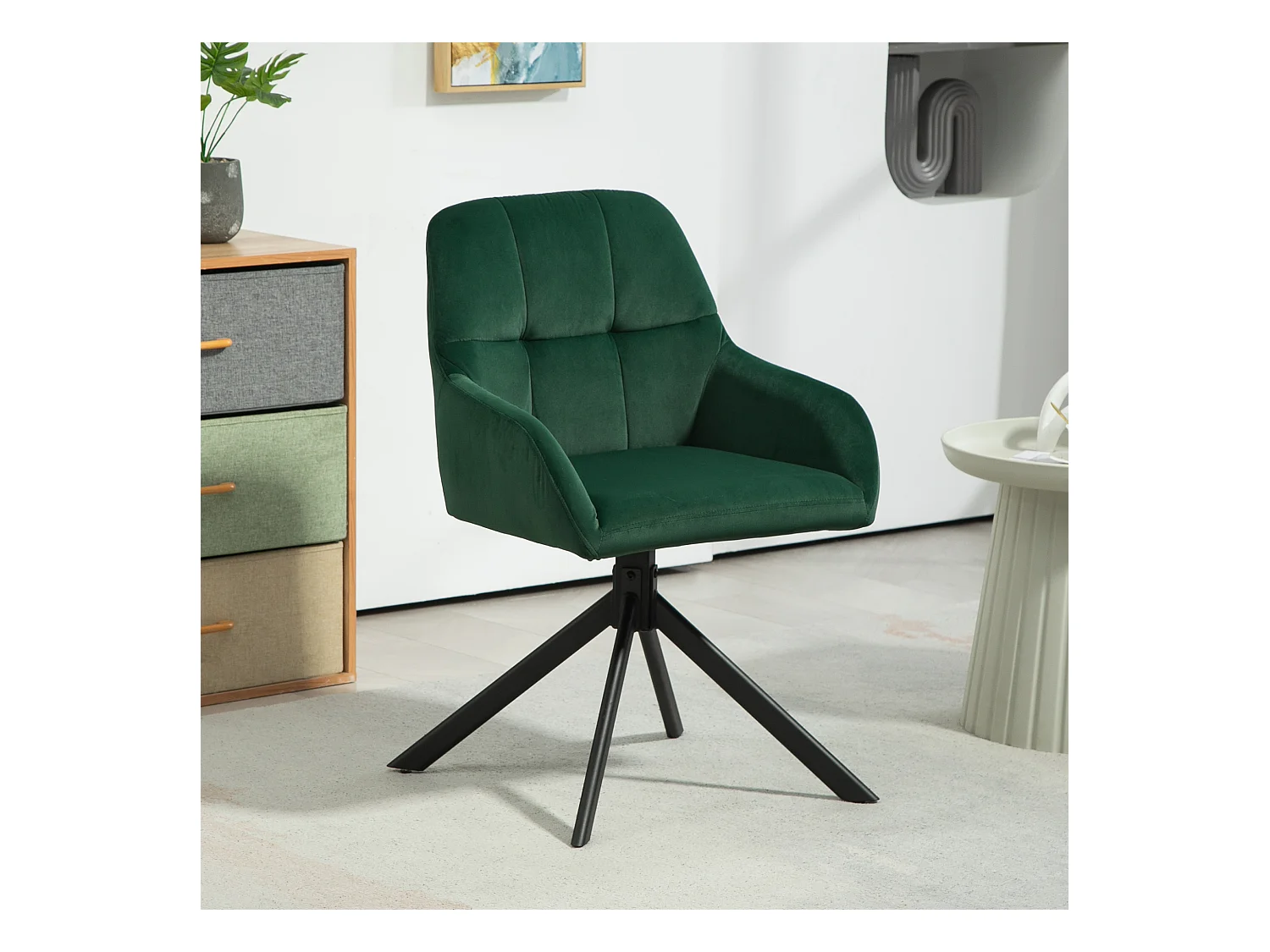 Poltroncina da camera con braccioli e seduta girevole in velluto verde