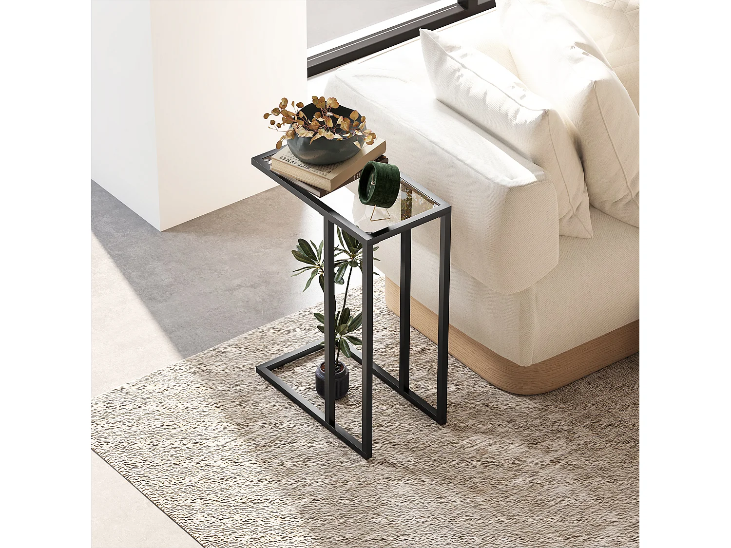 Tavolino da caffè a forma di c in vetro e acciaio nero