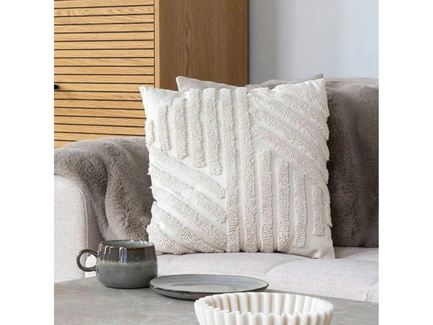 Coussin de canapé blanc avec motif en relief BRUGES