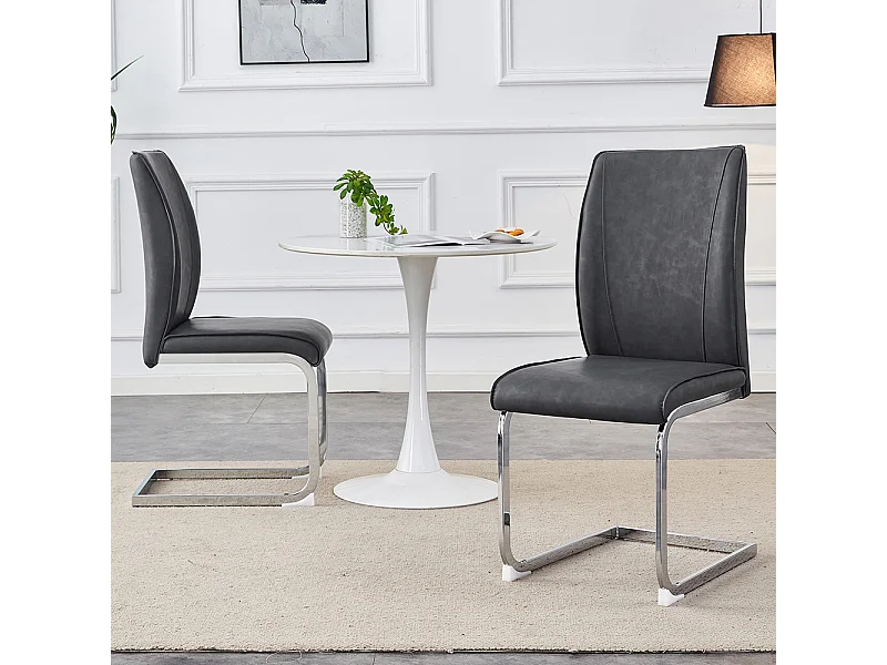 Lot de 2 chaises PU gris coussins confortables pieds métal argenté design moderne