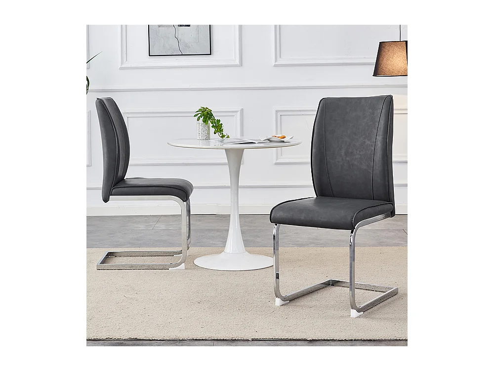 Lot de 2 chaises PU gris coussins confortables pieds métal argenté design moderne