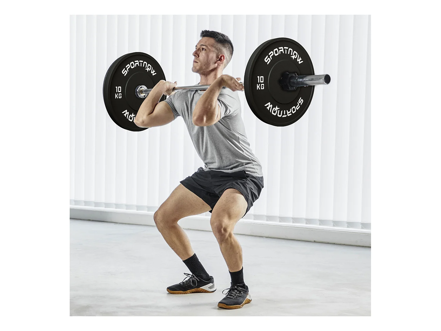 Set de 2 disques de poids 10kg, caoutchouc, trou Ø50mm, noir (45x45x4cm)