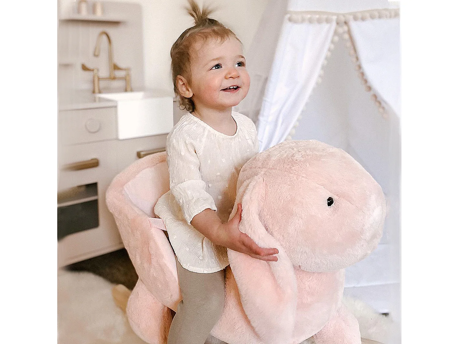 Dondolo giocattolo coniglio per bambini suoni realistici peluche rosa