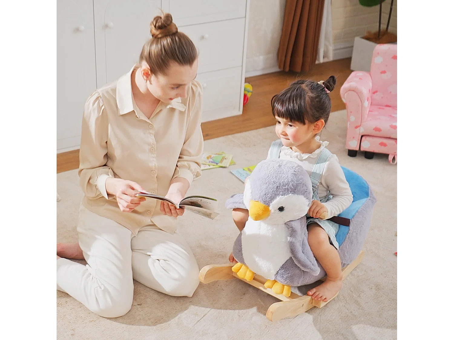 Cavallo a dondolo pinguino in peluche con musiche e cintura