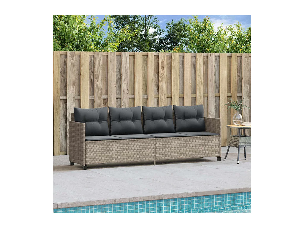 Chaise longue met lichtgrijze kussens van geweven hars