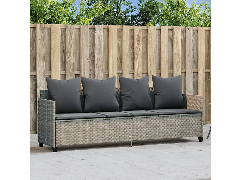 Chaise longue met lichtgrijze kussens van geweven hars