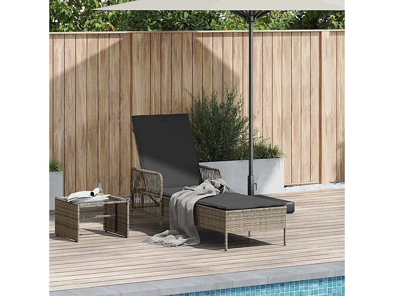 Chaise longue avec coussin en poly rattan, grise.