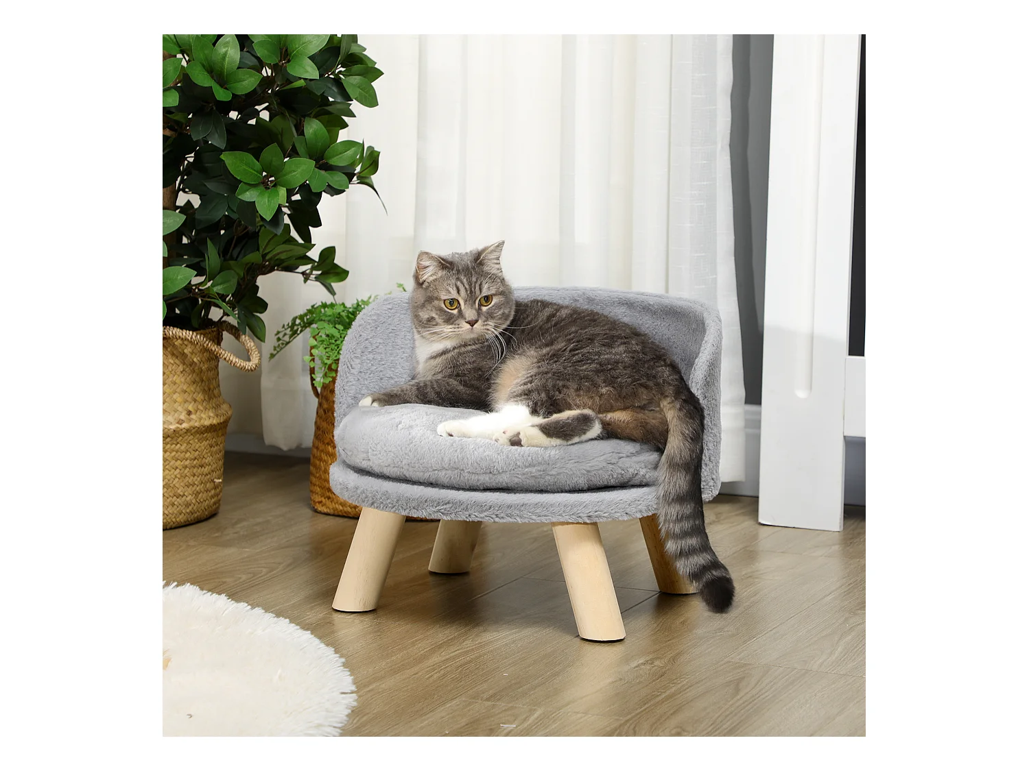 Divano per cani rotondo in tessuto di peluche e legno con cuscino