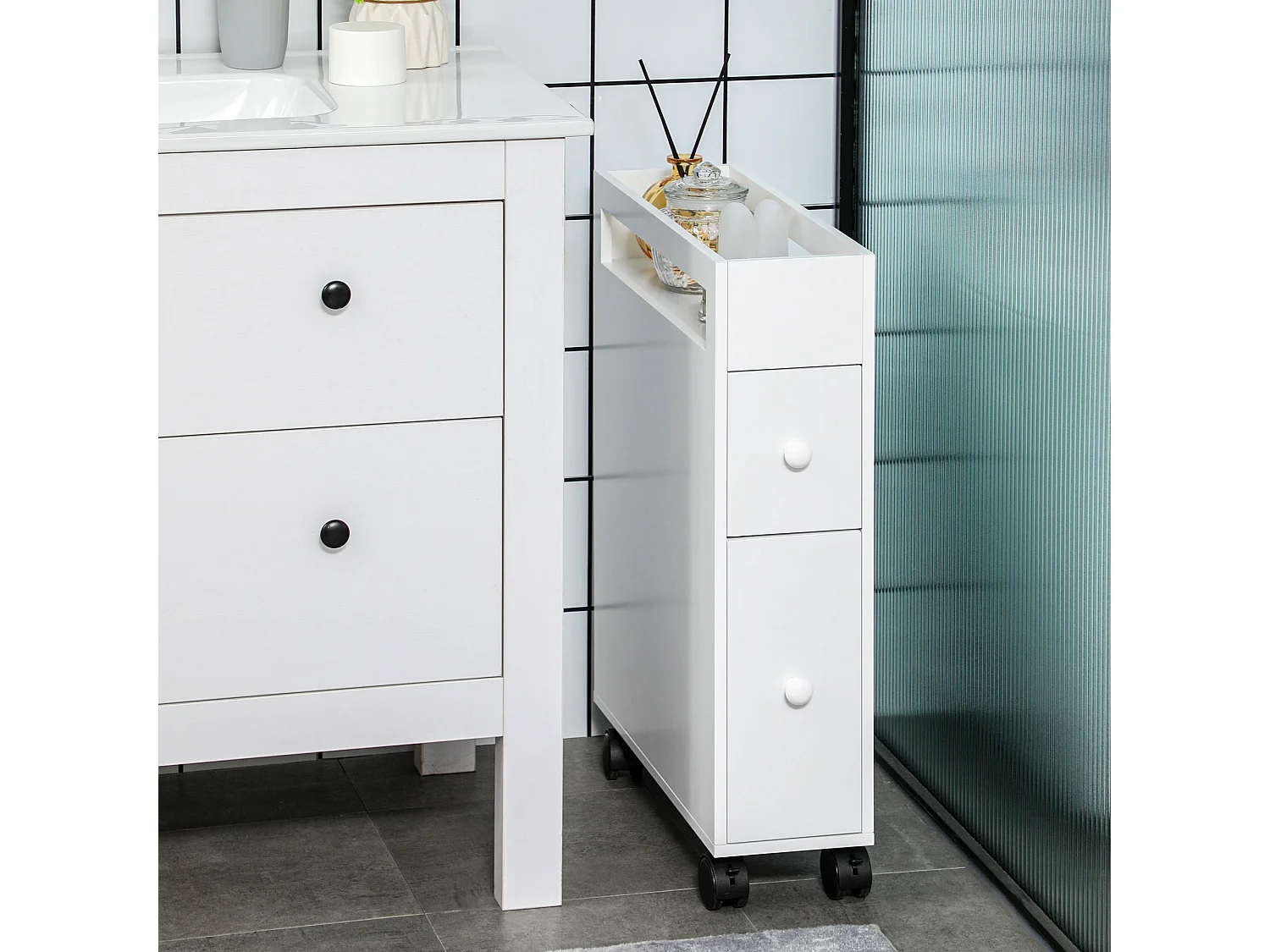 Mueble de baño de MDF blanco con ruedas y cajones compactos 66x49,5x16cm