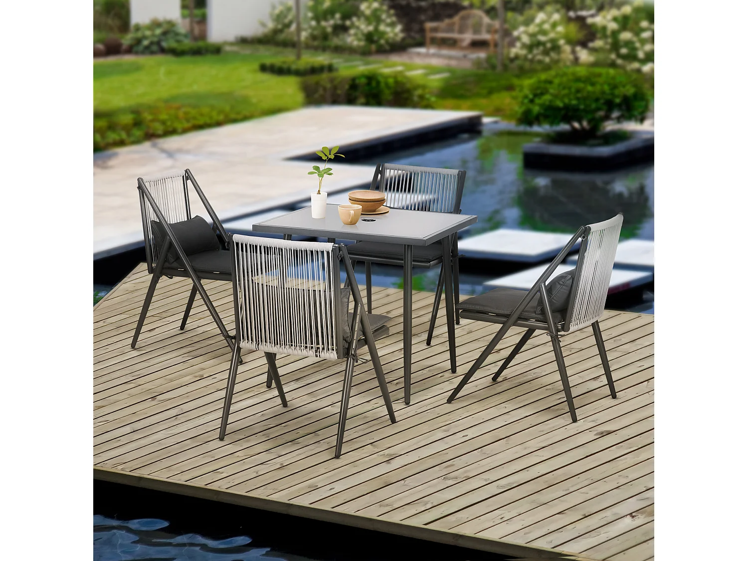 Set da giardino con 4 sedie con cuscini e tavolo quadrato in vetro