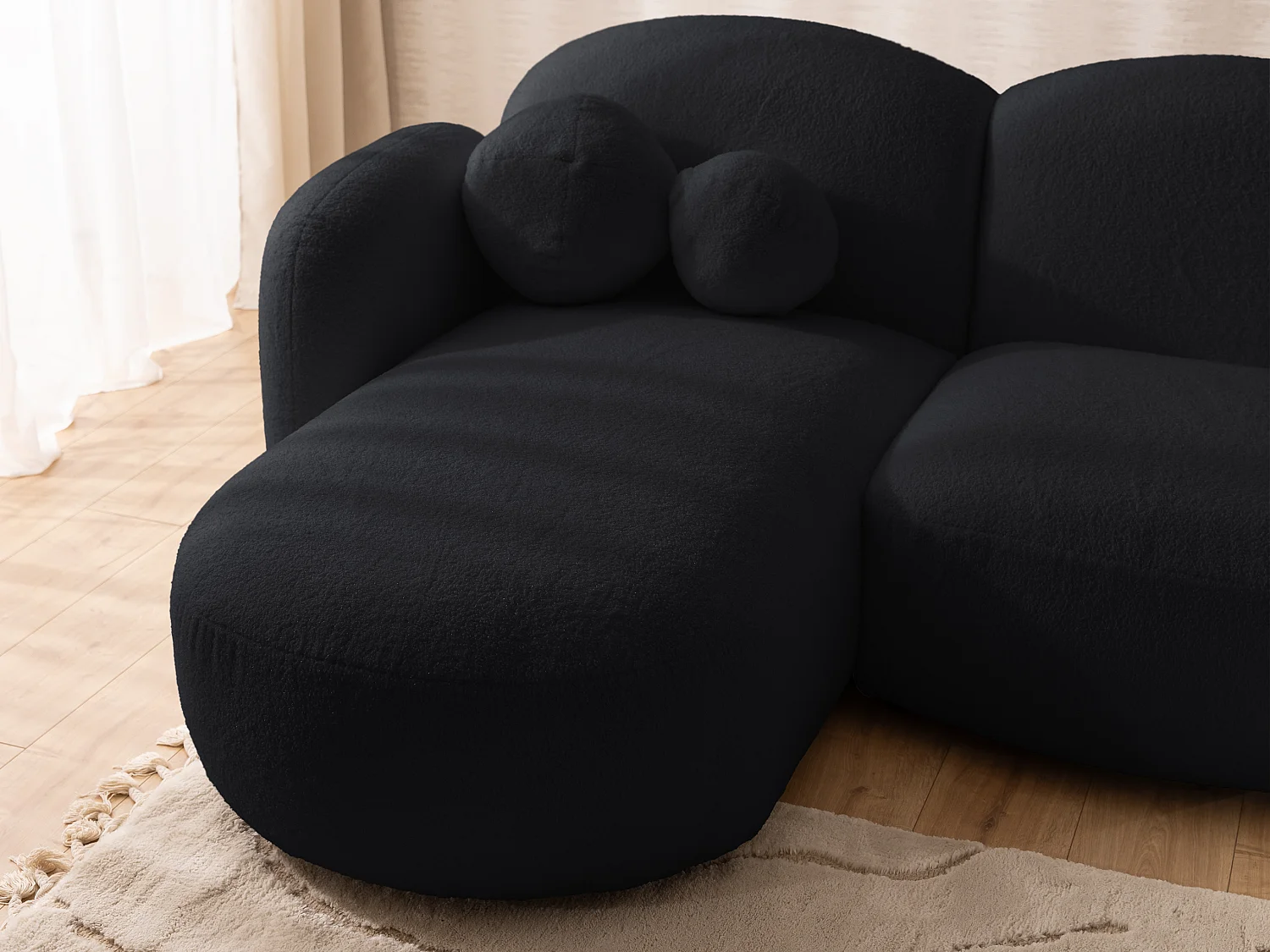 Nuvola - Moderne Wohnlandschaft aus Schwarz Bouclé mit abgerundetem Design und hohem Sitzkomfort