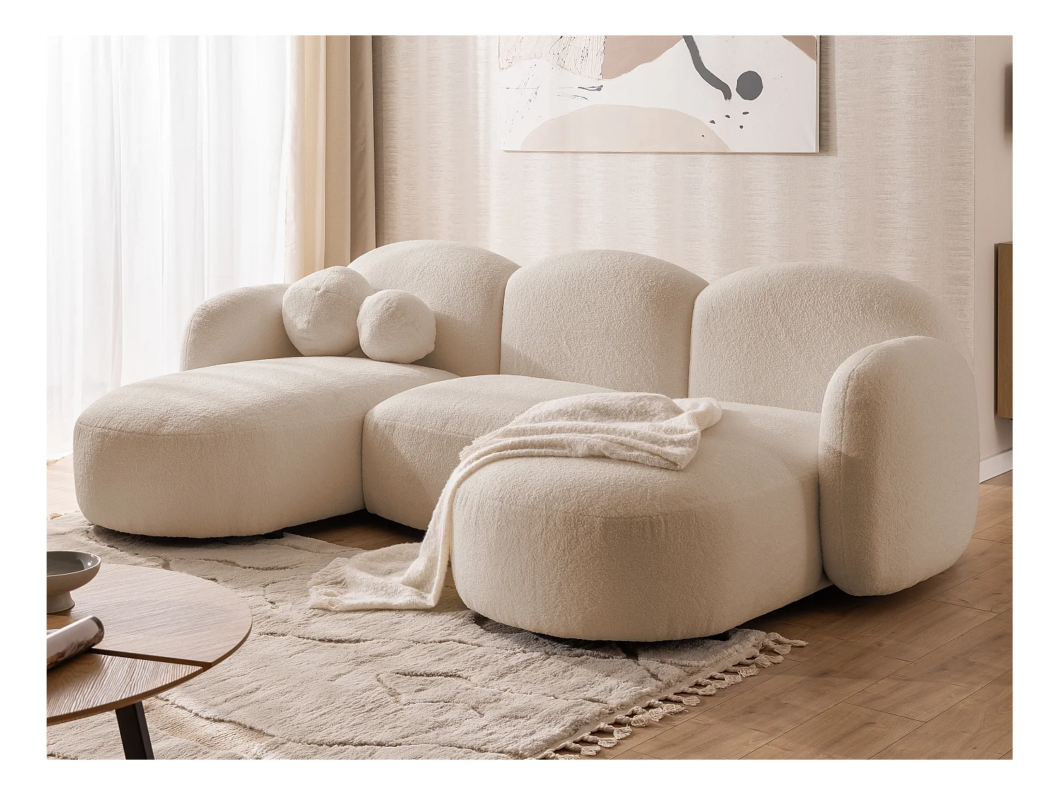 Nuvola - Moderne Wohnlandschaft aus Hellbeige Bouclé mit abgerundetem Design und hohem Sitzkomfort