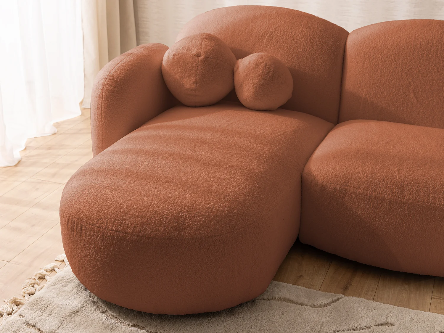 Nuvola - Moderne Wohnlandschaft aus Terrakotta Bouclé mit abgerundetem Design und hohem Sitzkomfort