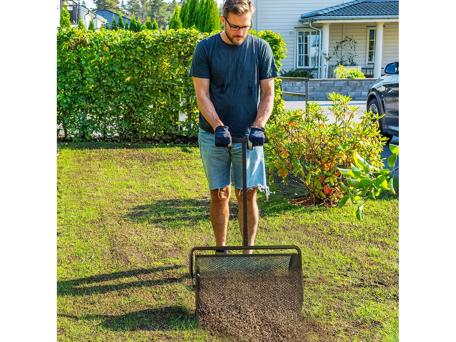 Spandiconcime da 75l con manico regolabile a t in metallo nero
