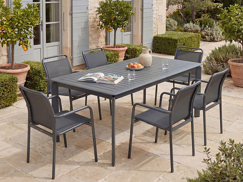 Salle à manger de jardin en aluminium : une table extensible L.205/286.5 cm et 6 fauteuils empilables - Gris foncé - VELYRA de MYLIA