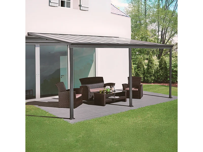 Pergola murale 3x5m anthracite en aluminium et polycarbonate avec gouttière. pergola adossée