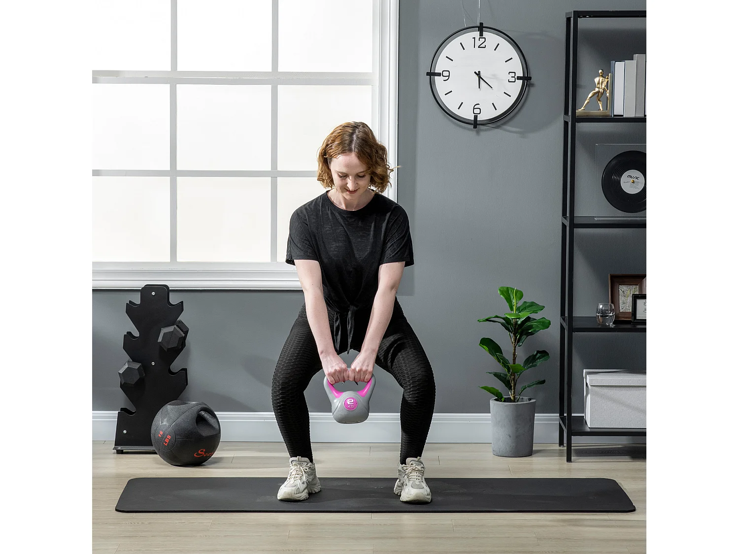 Kettlebell 2kg in pu e sabbia con base piatta e impugnatura rosa