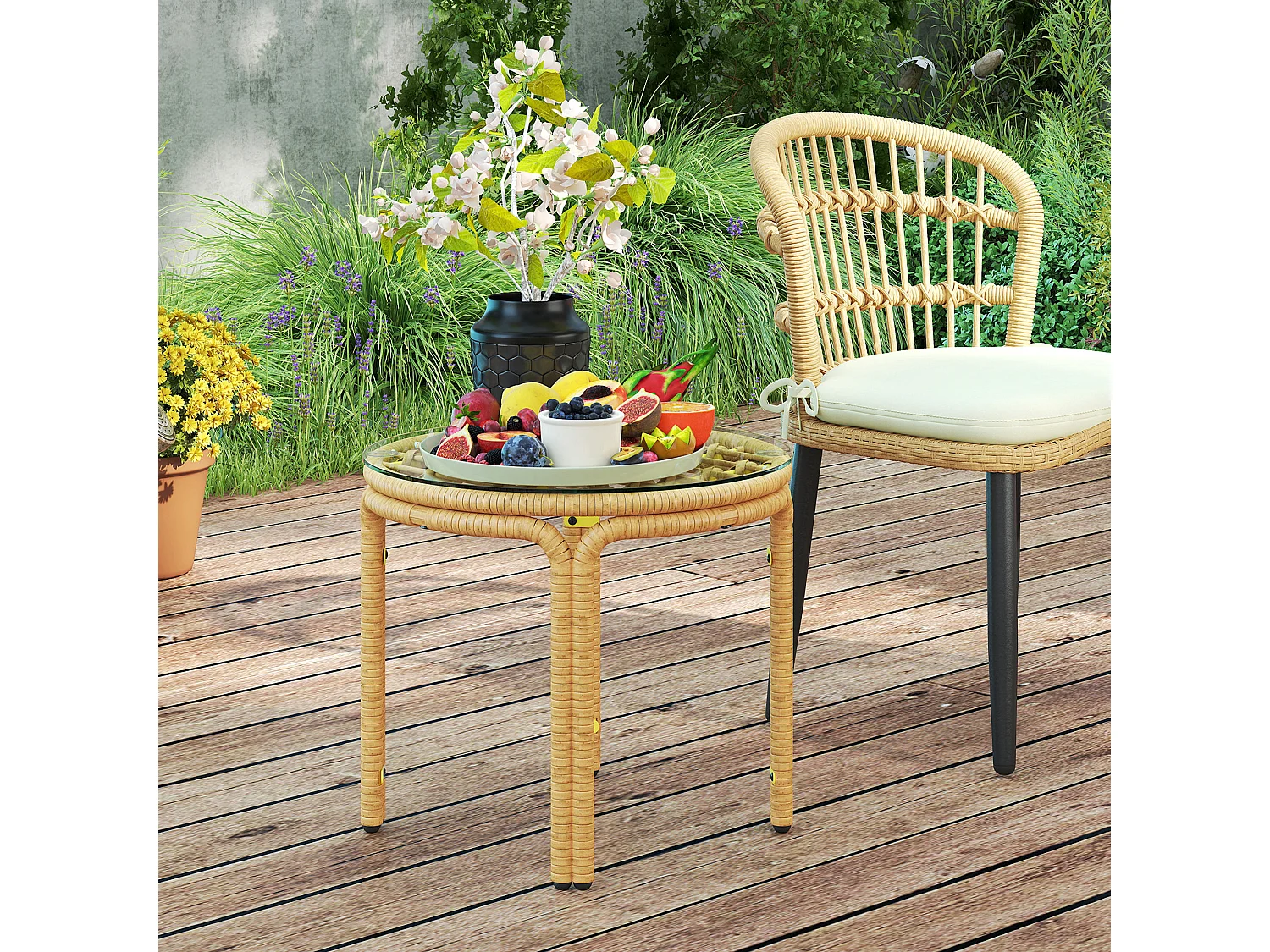 Tavolino da giardino stile boho in rattan e vetro giallo