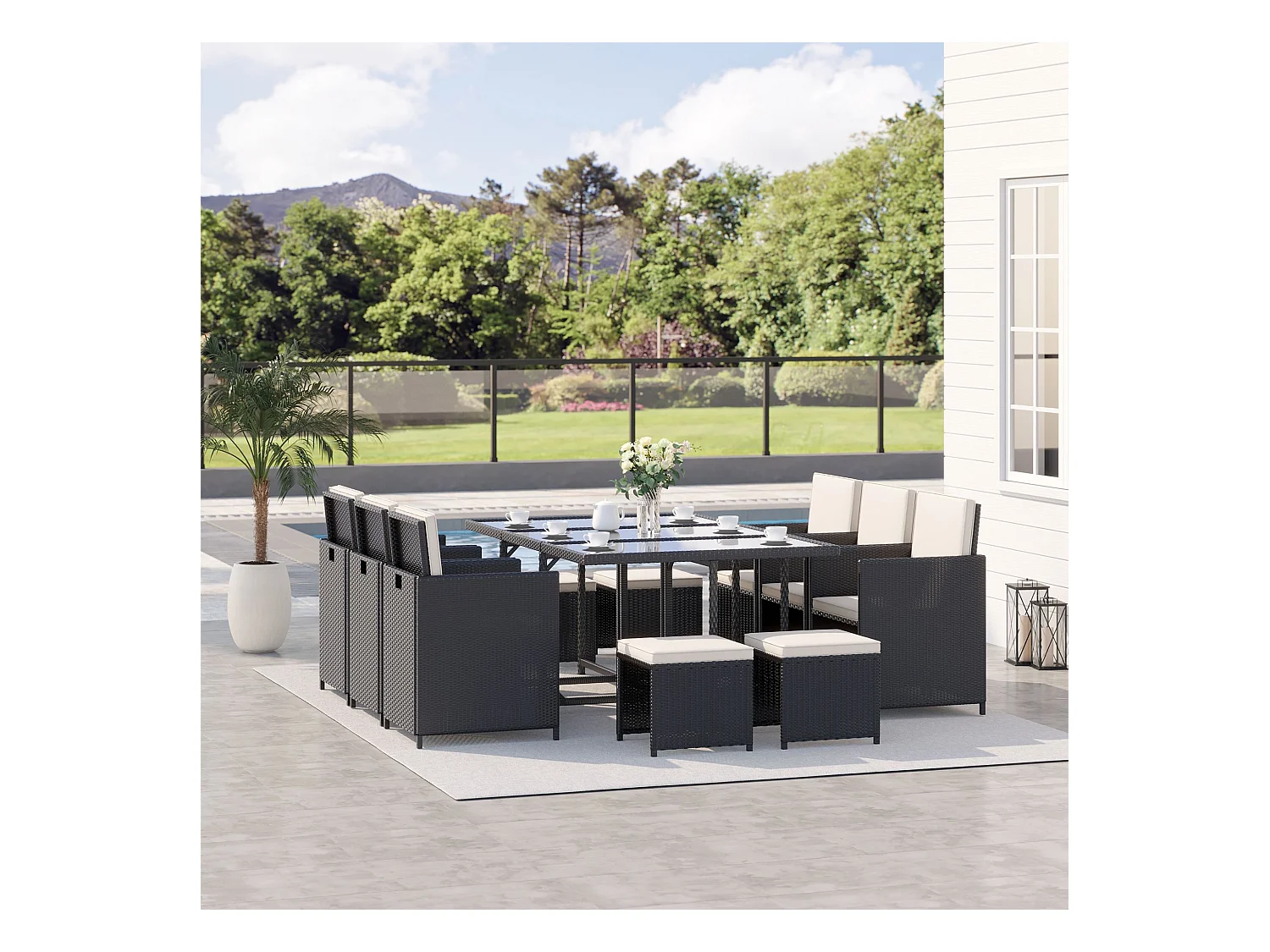 Set da giardino con tavolo 6 sedie e 4 sgabelli con cuscini nero