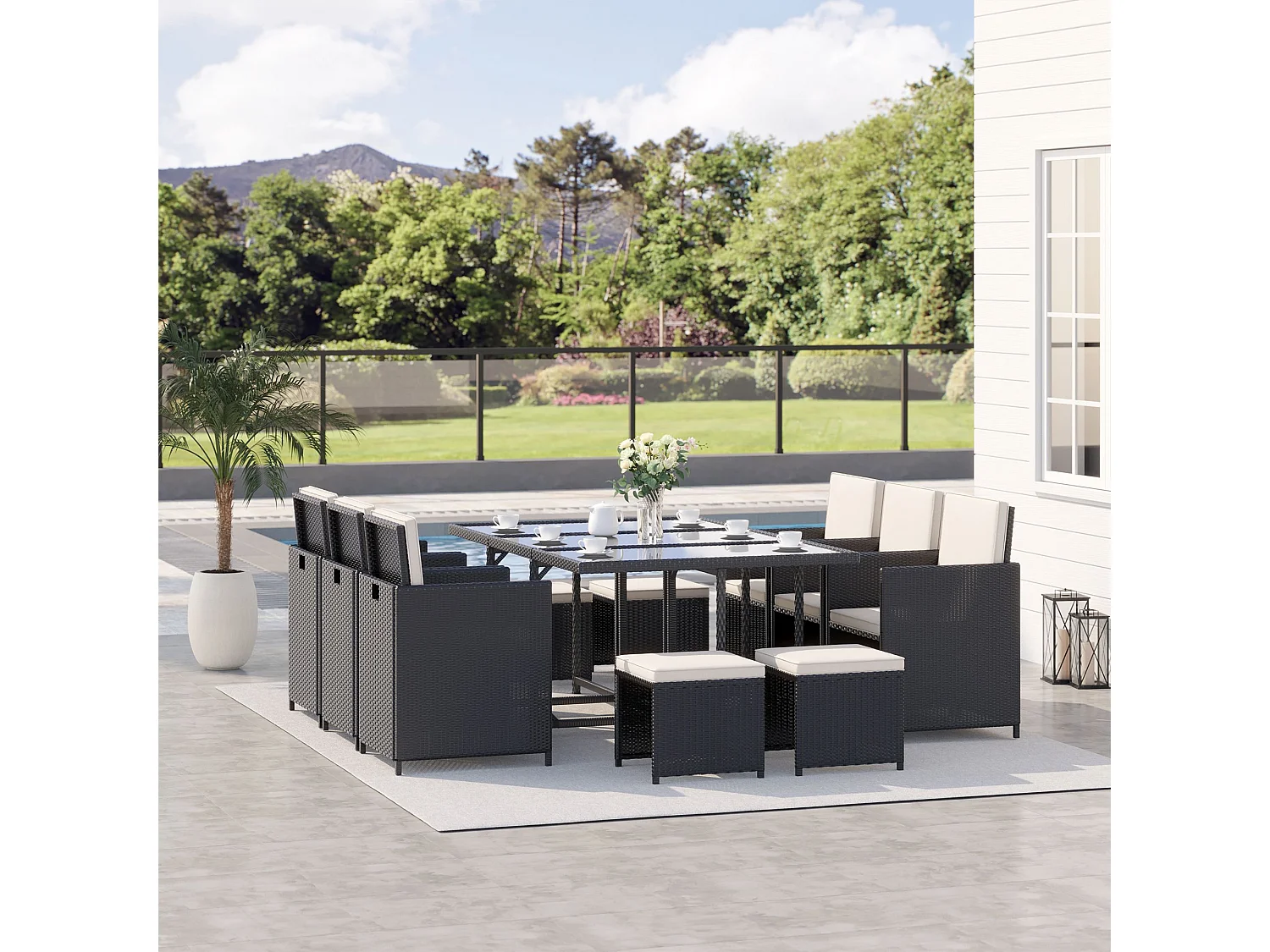 Set da giardino con tavolo 6 sedie e 4 sgabelli con cuscini nero