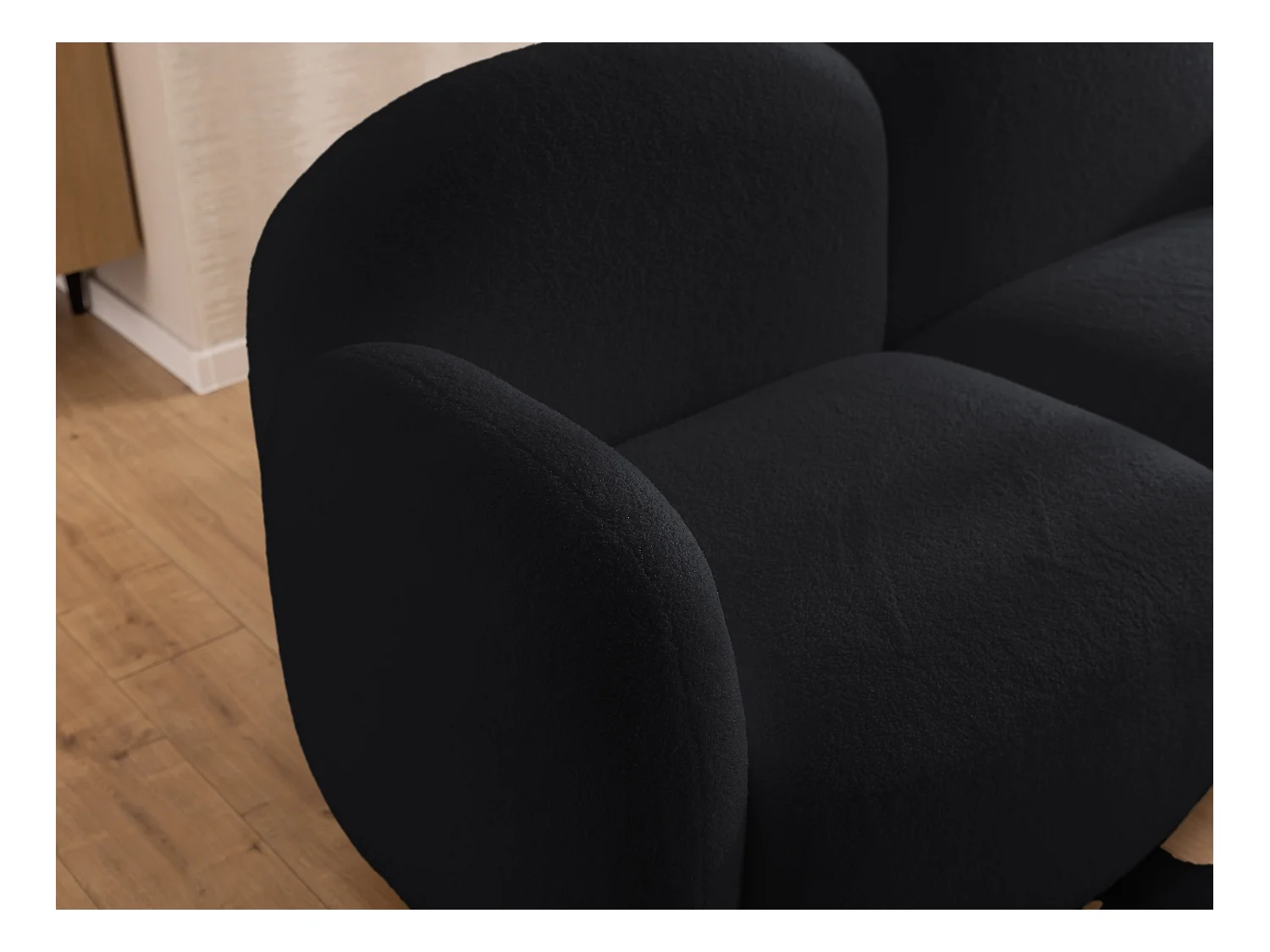 Nuvola - Moderne Ecksofa L-Form aus Schwarz Bouclé-Stoff mit abgerundetem Design und hohem Sitzkomfort