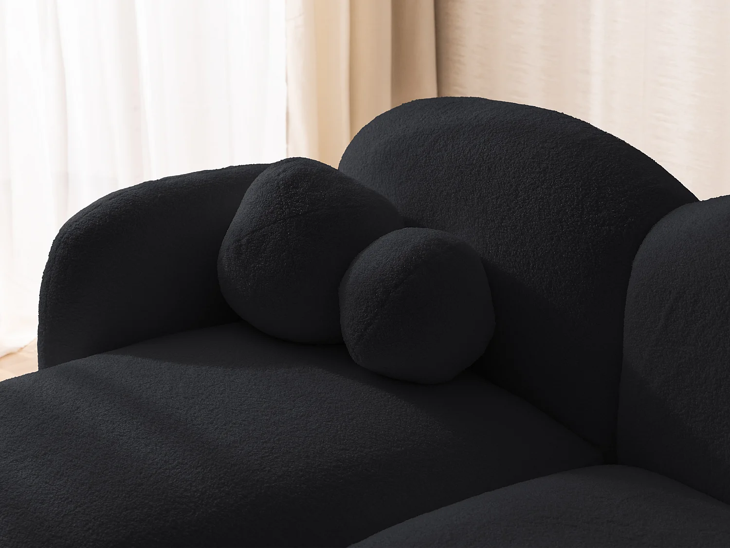 Nuvola - Moderne Ecksofa L-Form aus Schwarz Bouclé-Stoff mit abgerundetem Design und hohem Sitzkomfort