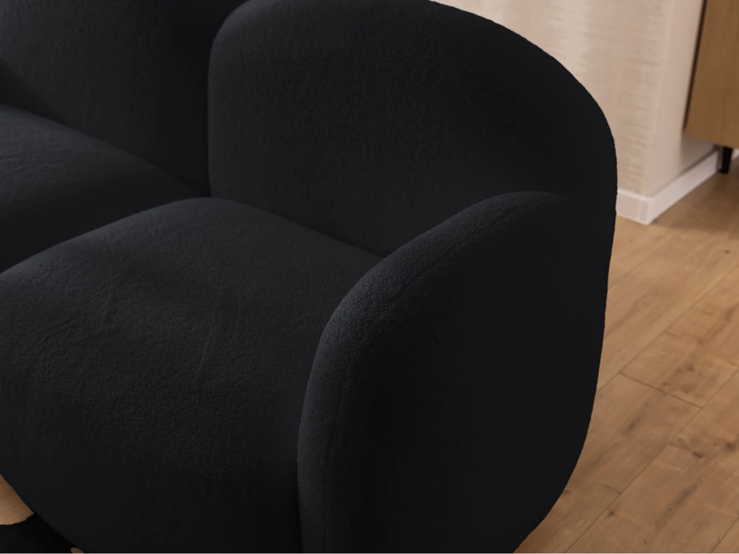 Nuvola - Moderne Ecksofa L-Form aus Schwarz Bouclé-Stoff mit abgerundetem Design und hohem Sitzkomfort