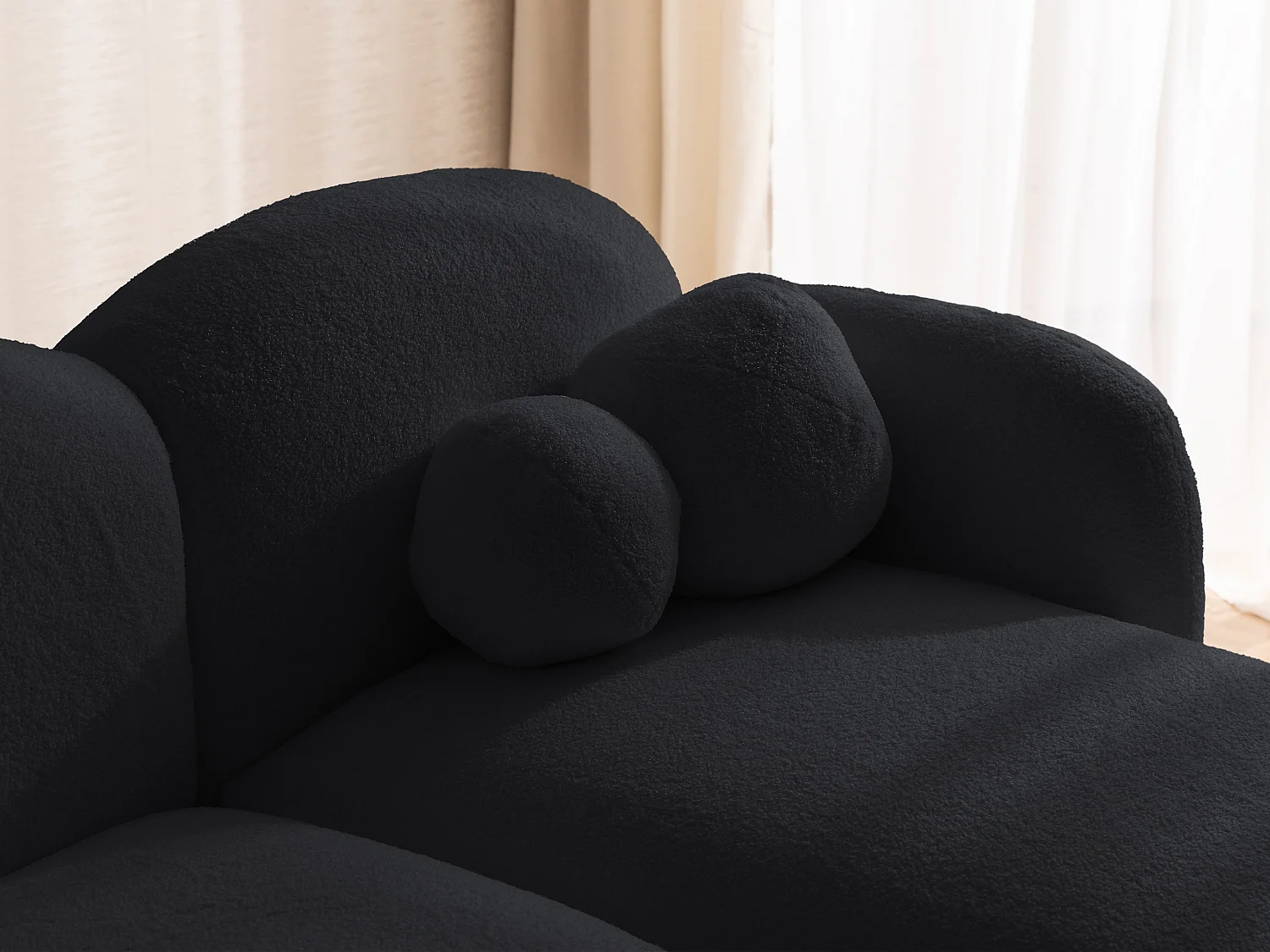 Nuvola - Moderne Ecksofa L-Form aus Schwarz Bouclé-Stoff mit abgerundetem Design und hohem Sitzkomfort