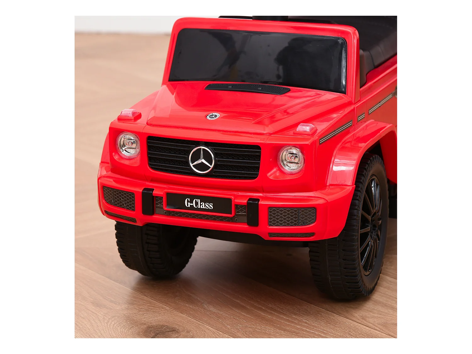 Macchina a spinta per bambini con tettuccio rosso