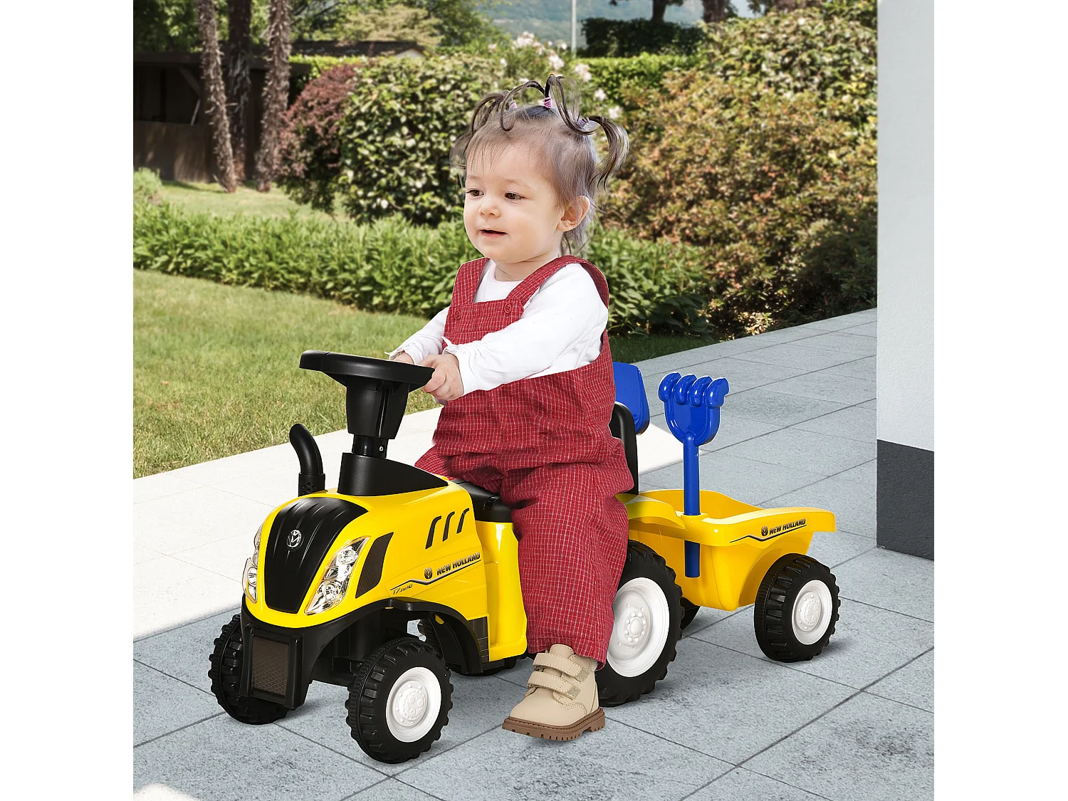 Trattore cavalcabile per bambini con rimorchio rastrello e pala