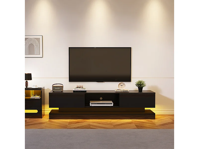 Meuble TV noir avec 2 tiroirs et compartiments de rangement ouverts, éclairage LED