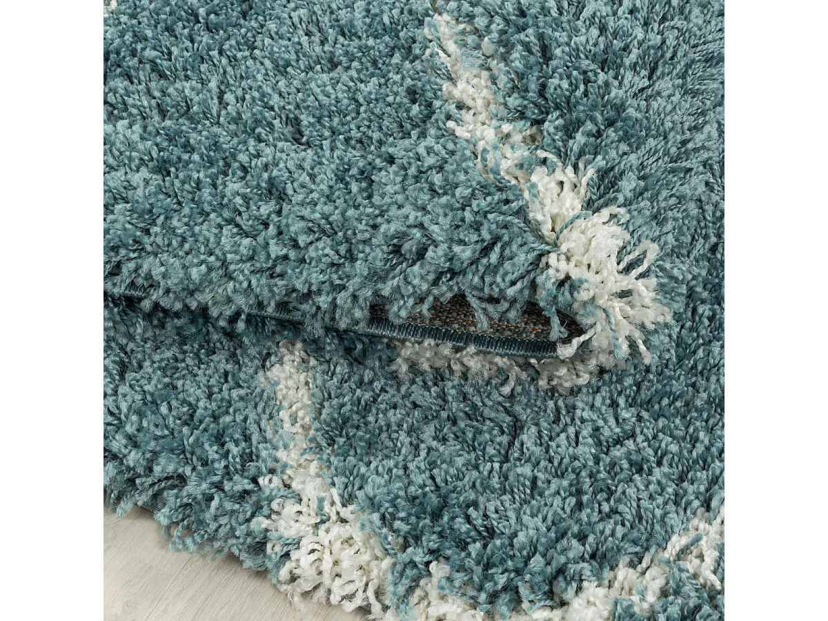 Tapis shaggy Ø200cm rond tissé turquoise et crème motif scandinave SCANDINAV A