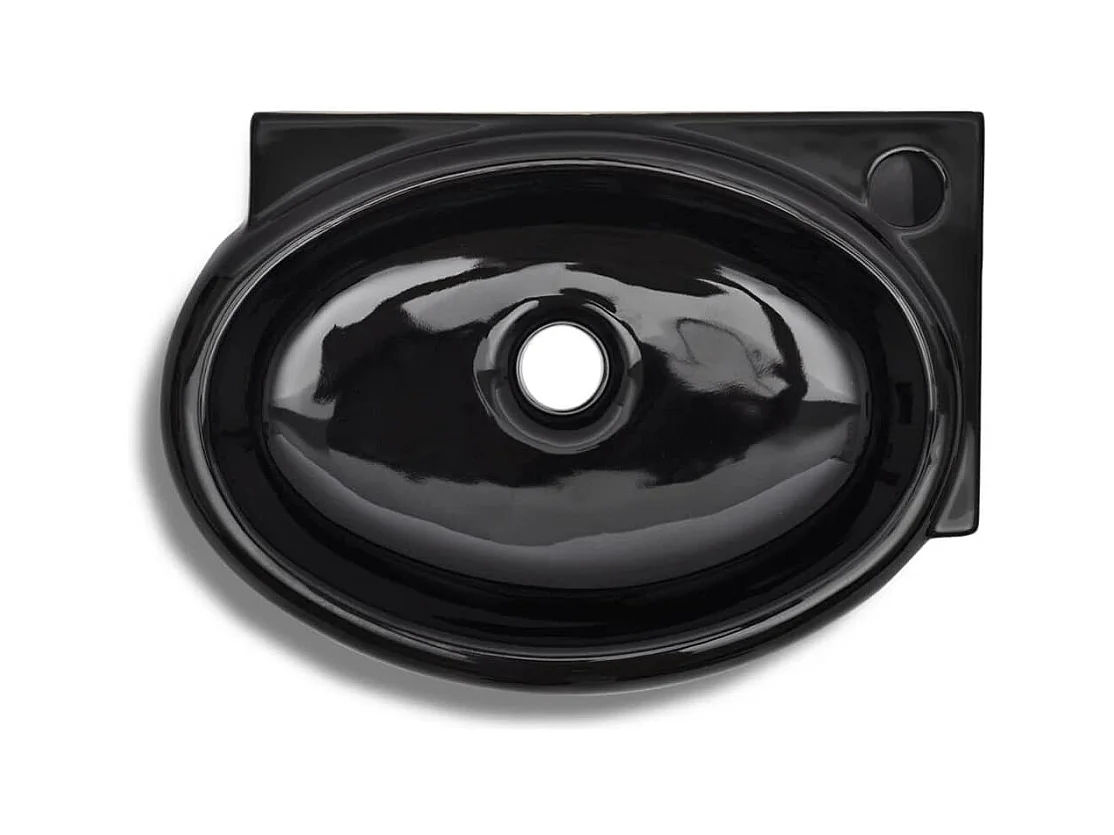 Zwarte keramische wastafel met overloop/kraangat