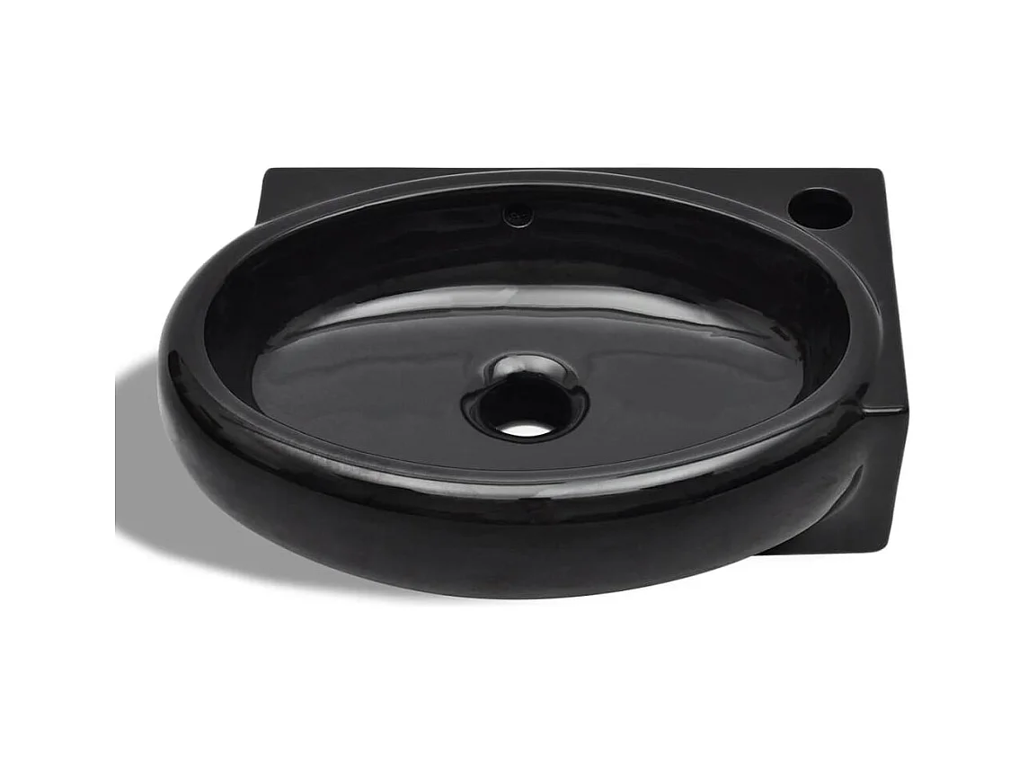 Zwarte keramische wastafel met overloop/kraangat