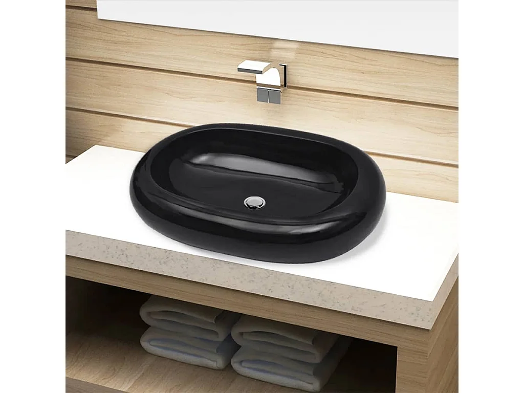Lavabo ovalado de cerámica negra para baño.