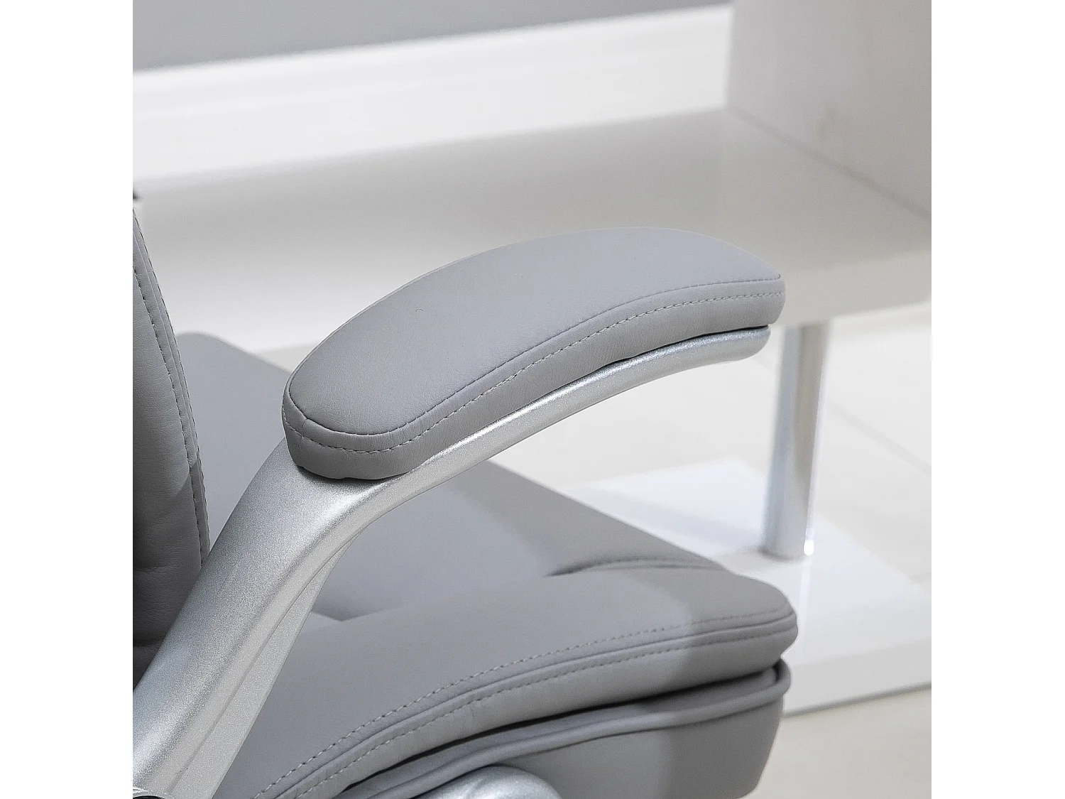 Fauteuil de bureau ergonomique en simili cuir gris accoudoirs réglables bascule hauteur 135 kg