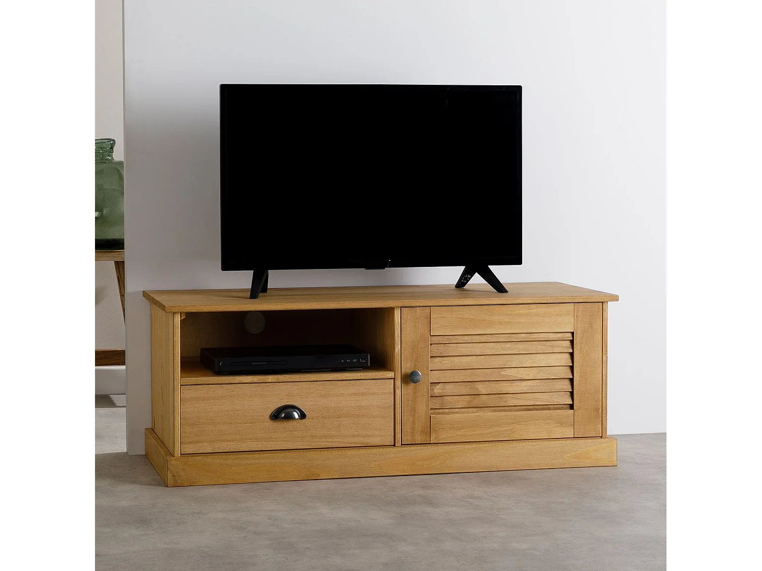 Meuble TV VENETA L 106 cm en bois massif coloris naturel avec 1 porte battante et 1 tiroir