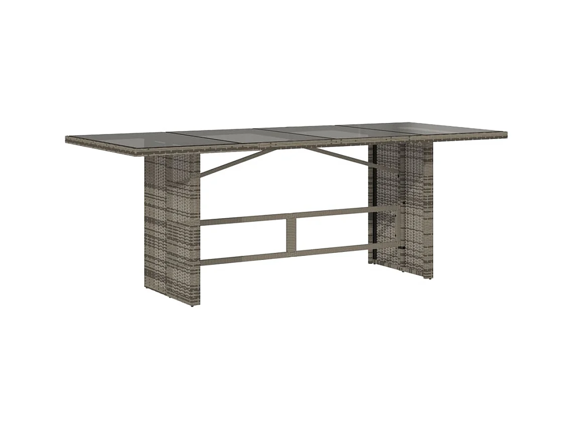 Tuintafel met grijs glazen blad en gevlochten hars