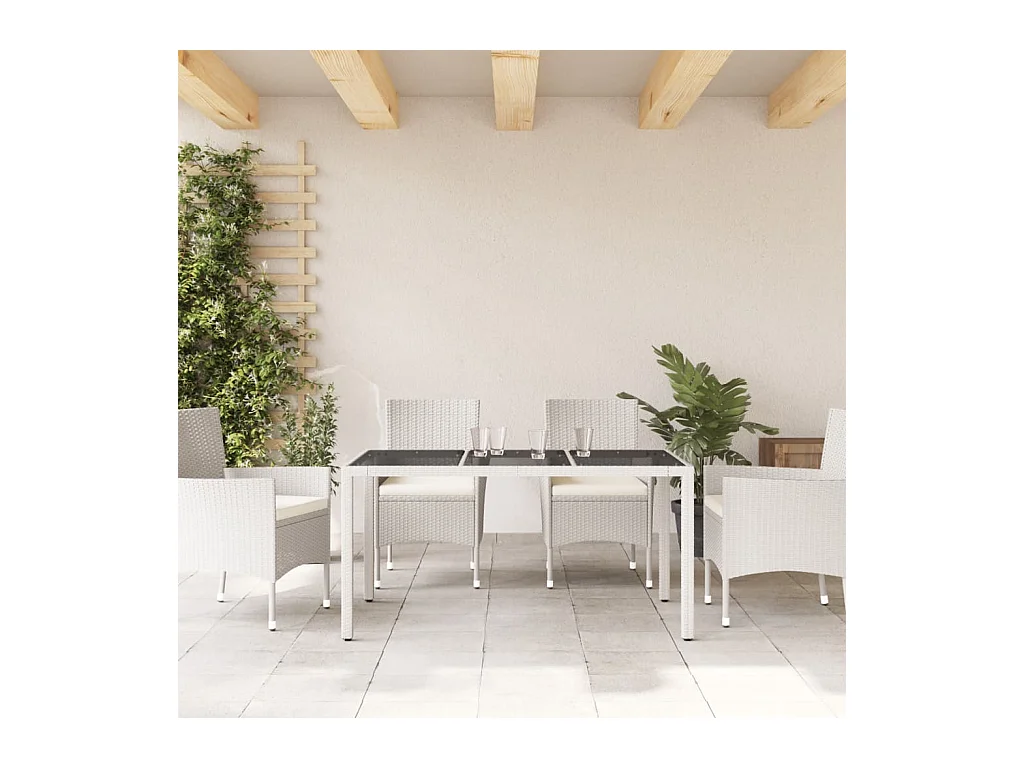 Tuintafel met wit glazen blad en gevlochten hars