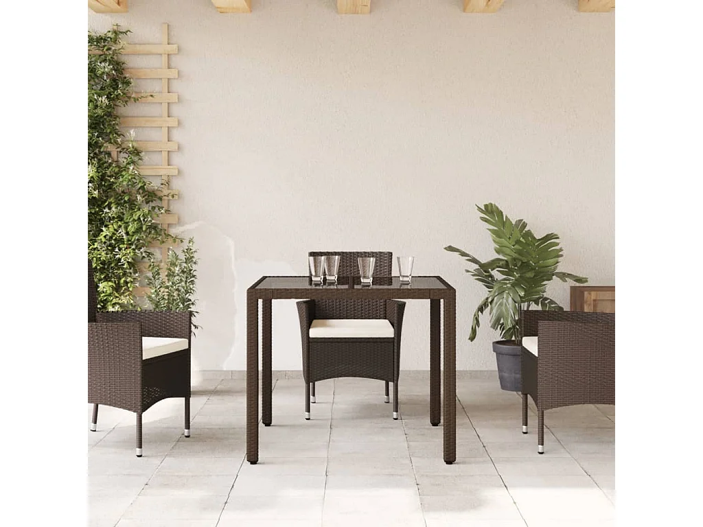 Tavolo da giardino con piano in vetro marrone e resina intrecciata