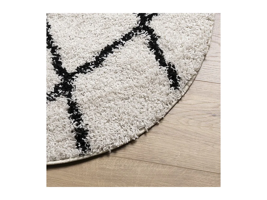 Alfombra moderna de pelo largo en color crema y negro, Ø 100 cm