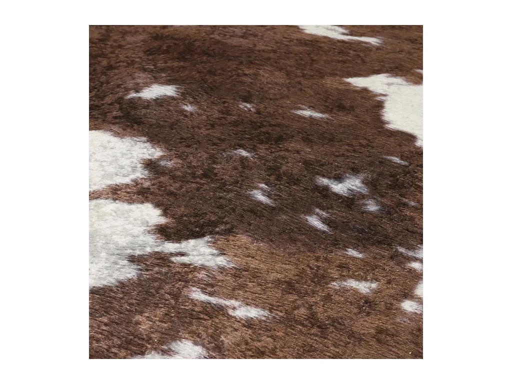 Tapis marron et blanc motif vache lavable antidérapant