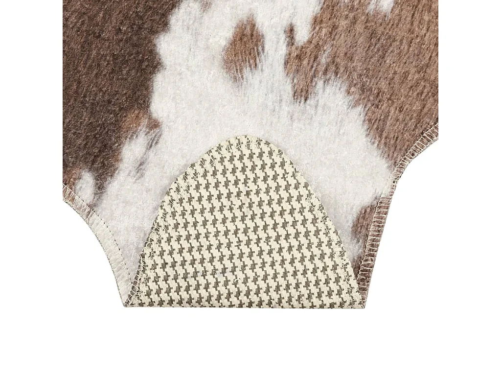 Tapis marron et blanc motif vache lavable antidérapant