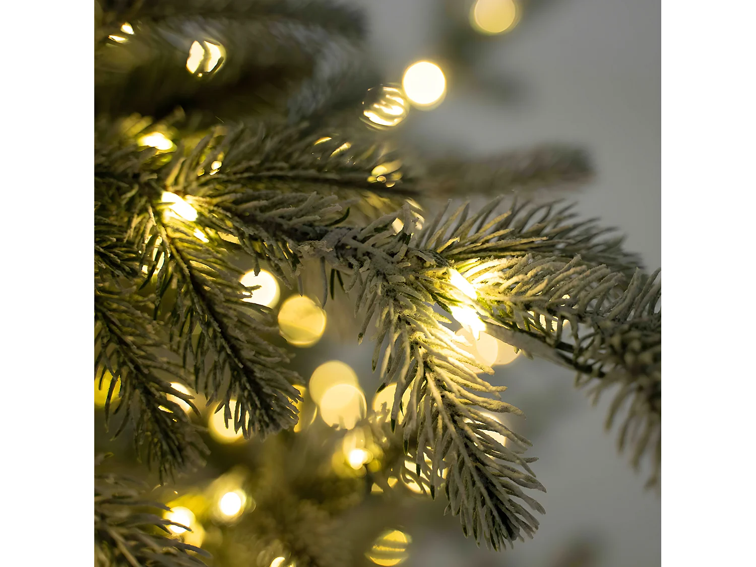 Besneeuwde kerstboom "Sistem flok" met micro-LED's in PE Real Touch-effect + PVC + Flock 180 cm